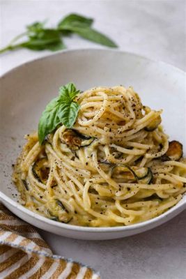  Spaghetti alla Nerano: Juuri kypsyneen sitruunan raikkuttavan kirpeyden ja suolaisen ricottajuuston harmoninen yhdistelmä!